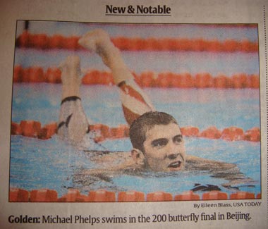 Michael Phelps crossing the lanes
