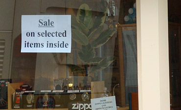 Sign reading Sale on Selected Items Inside