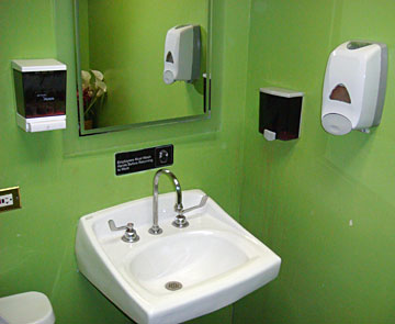 Bathroom sink with three soap dispensers