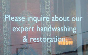 window sign offering expert handwashing