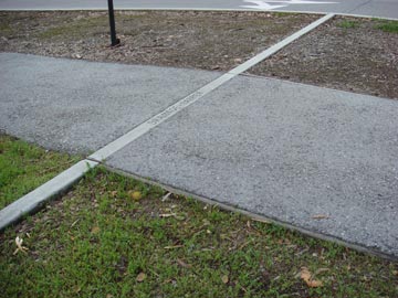 Curb running through a sidewalk