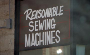 Sign advertisting reasonable sewing machines