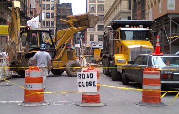 Road close sign in front of road construction
