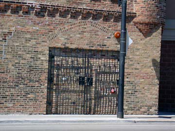 Gated brick wall