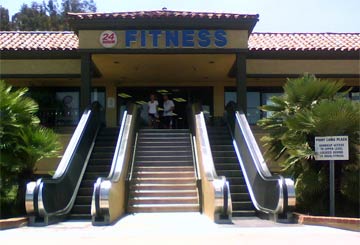 Fitness center with escalator