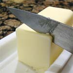 knife cutting butter