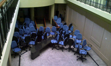 Office chairs in a herd