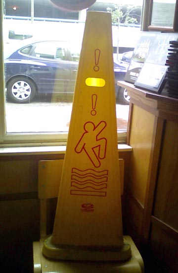 A yellow warning cone