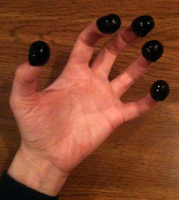 five olives on five fingers