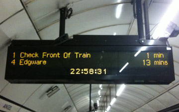 Train sign reading 'Check front of train'