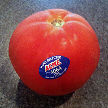 Tomato with a scanner code on it