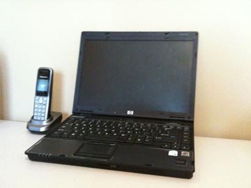 A laptop computer and telephone