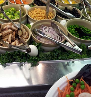 A salad bar with eggs interspersed