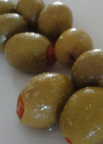 Pitted green olives, stuffed with pimentos