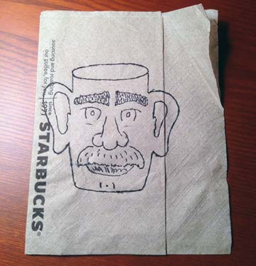 A sketch of a face on a coffee mug