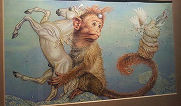 A painting of a monkey with cupcake on its tail holding a horse