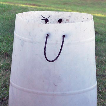 A face on a white bin