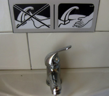 A no feet washing sign