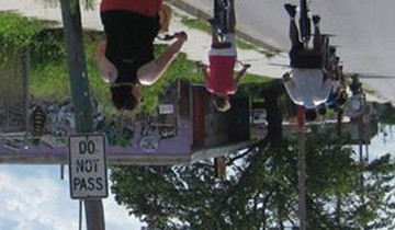 Cyclists riding on the ceiling