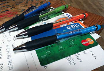 Color coordinated pens and credit cards
