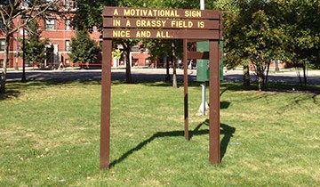 A motivational sign in a park