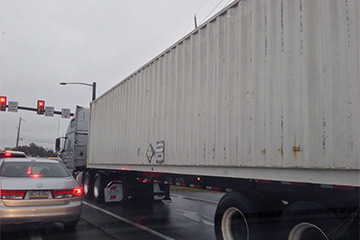 A placard on the side of a truck