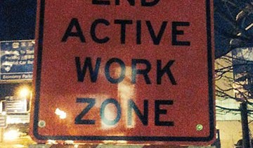 An end active work zone sign