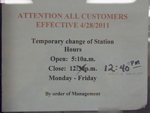 A temporary hours change sign