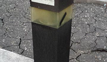 A lamp post with "THIS ONE" on it