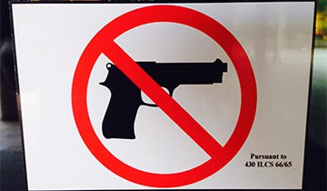 A "no hand guns" sign