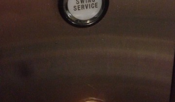 "Swing Service" button in an elevator