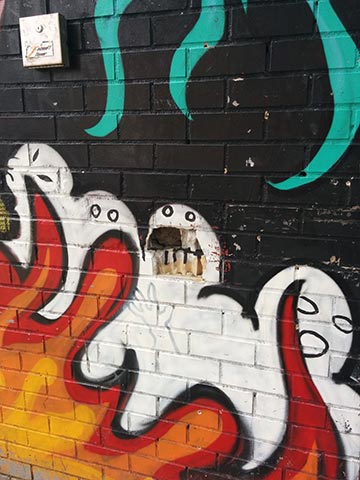 A mural of ghosts