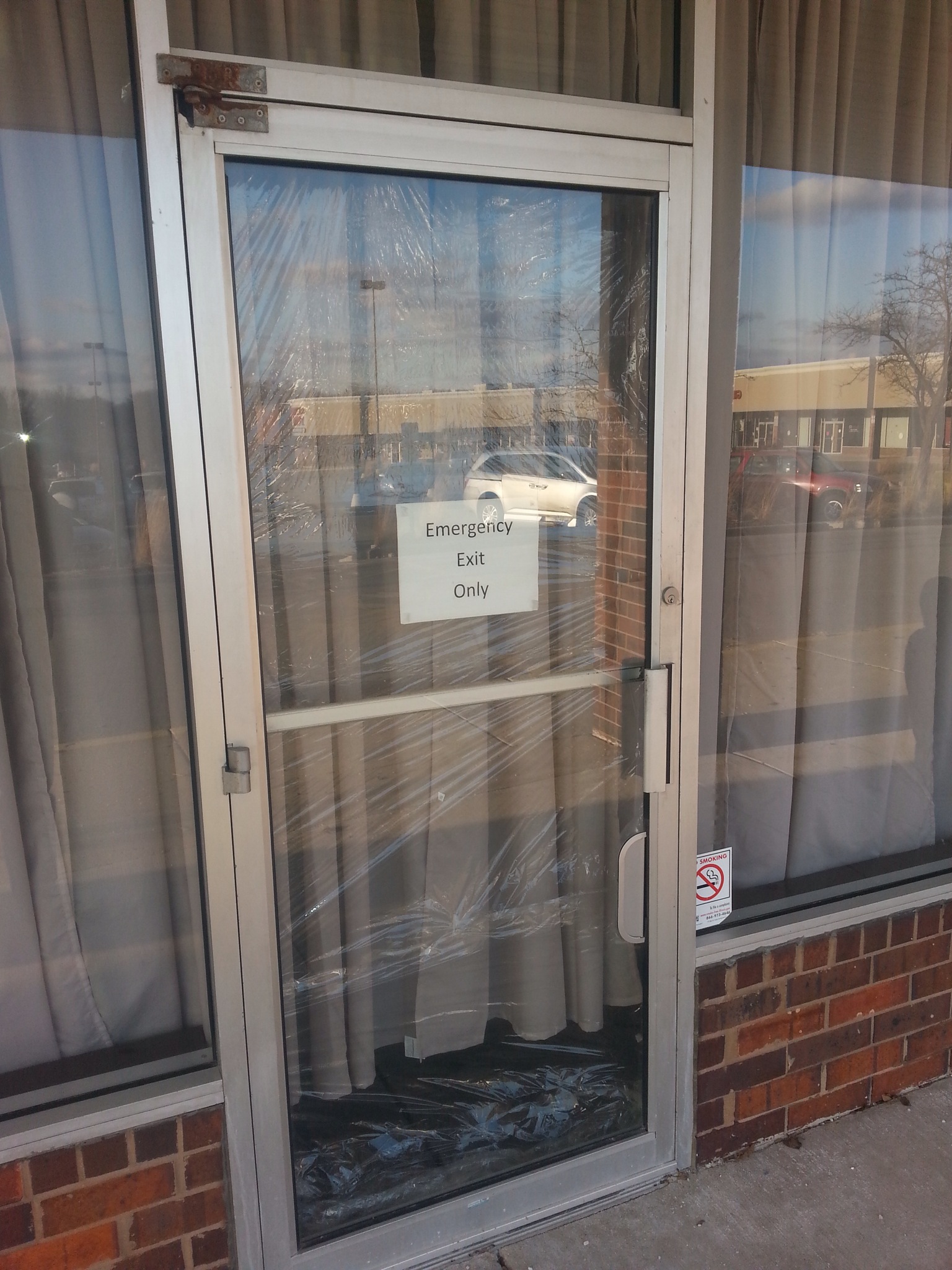 Plastic wrapped emergency exit