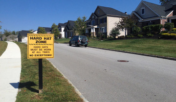 "Hard hat zone" sign at the entrance to a neighborhood