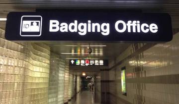 A sign for the Badging Office