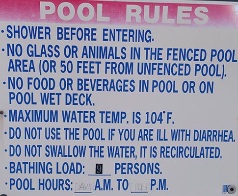 A sign of pool rules