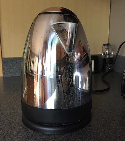 A broken tea kettle