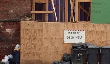 A Danger Open Hole sign