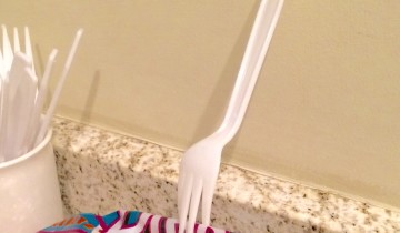 A plastic fork used as a chip clip
