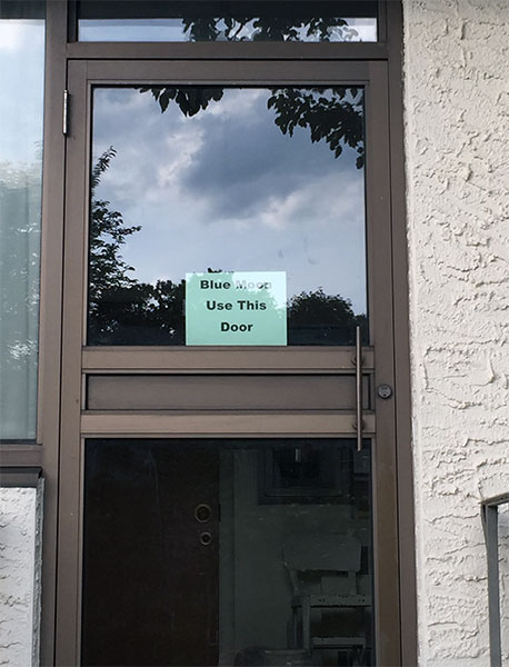 A door with a sign on it