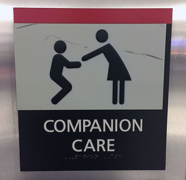 An airport sign for companion care