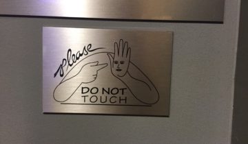 A weird do not touch sign